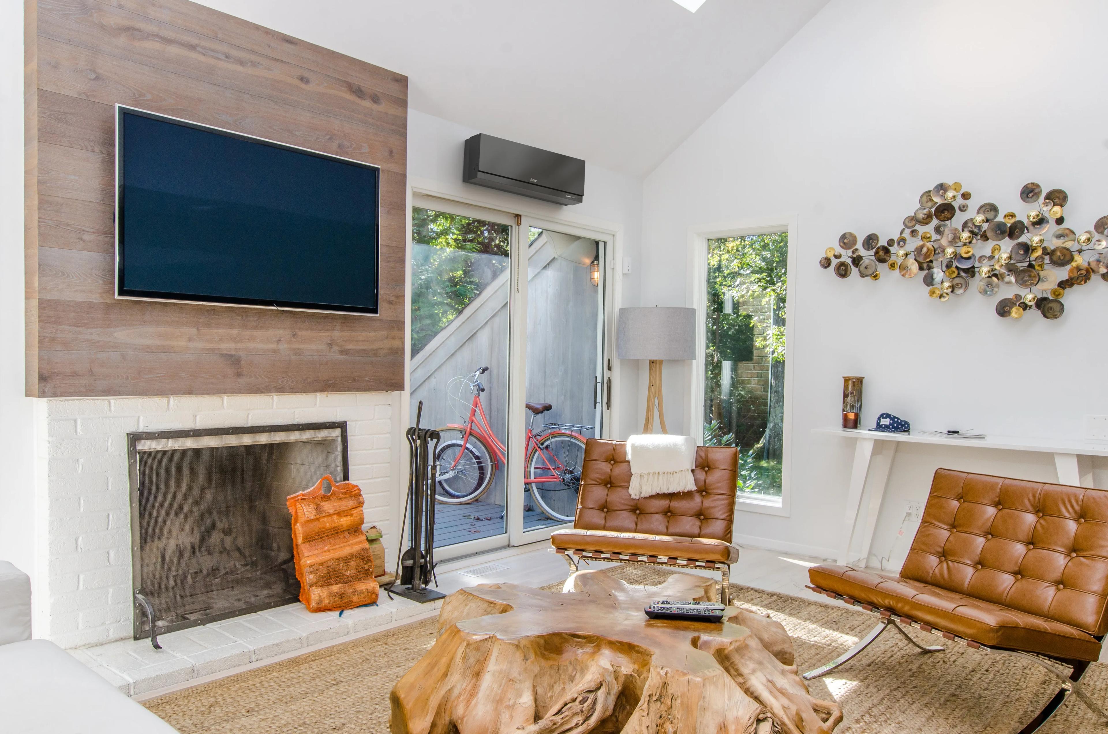Black MSZ-EF Wall-Mounted Indoor Unit in Family Room Setting