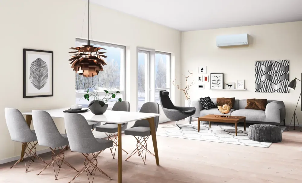 interior of home with modern living room and dining room with mitsubishi electric heat pump mini split wall unit