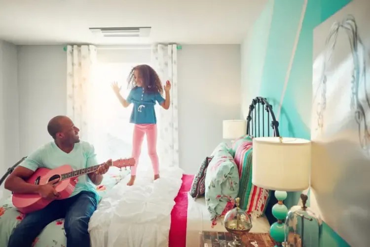Keeping Cool for Back to Schoolindoors people room family man mirror woman child adult fun guitar love two relaxation girl instrument wear painting