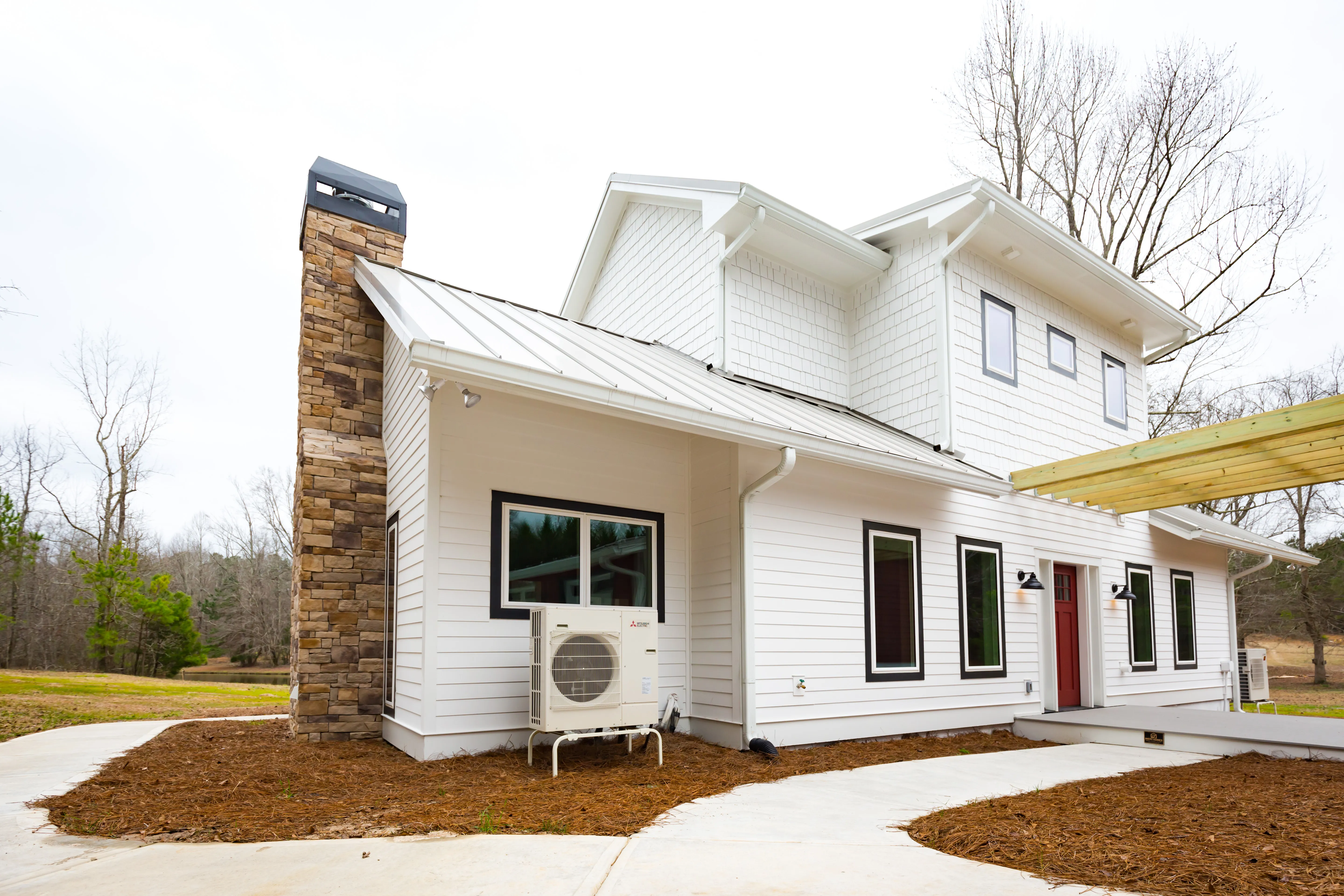 Outdoor unit for heat pump mini split system in Kuntz residence