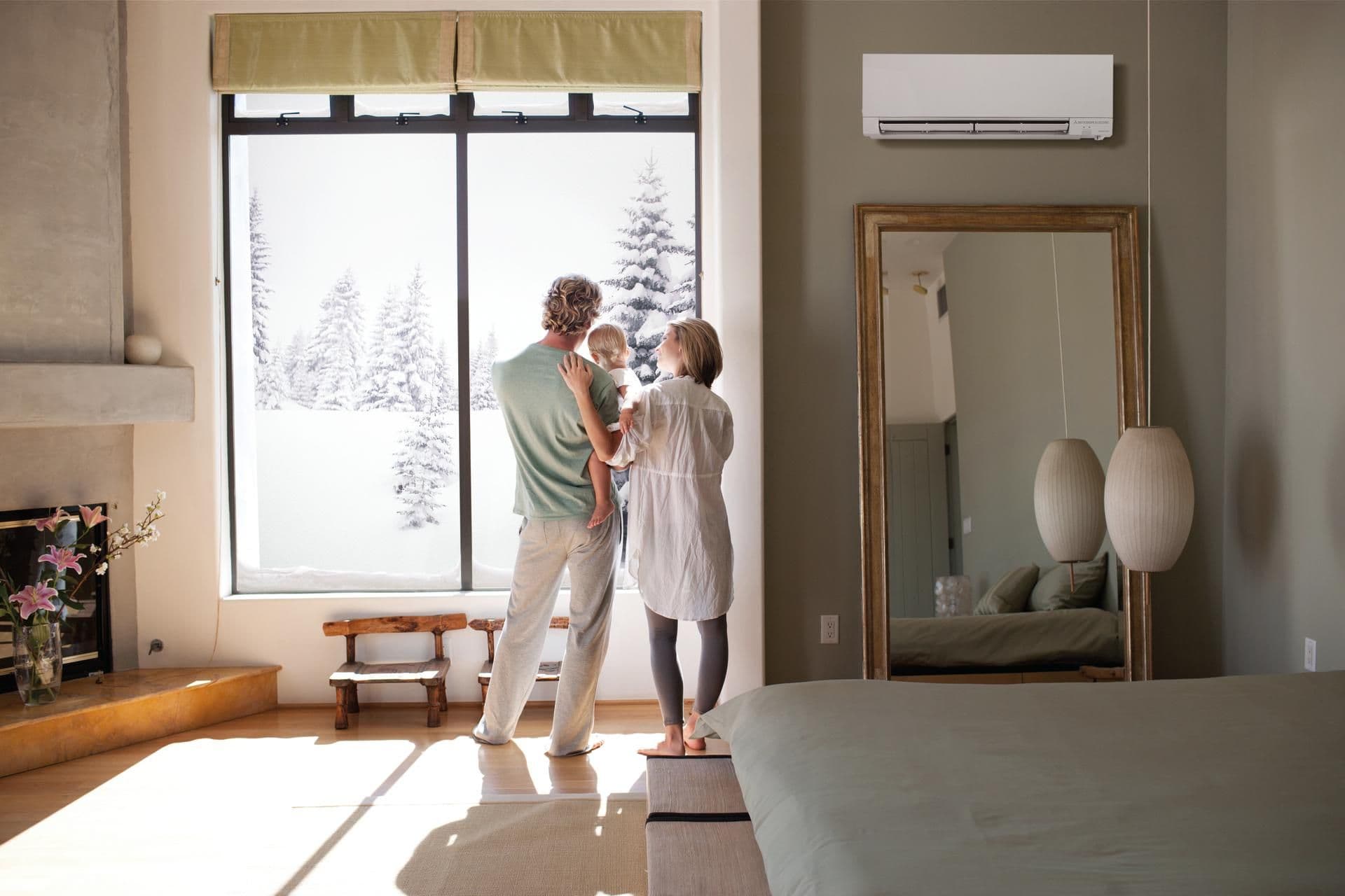 Family inside room looking out window